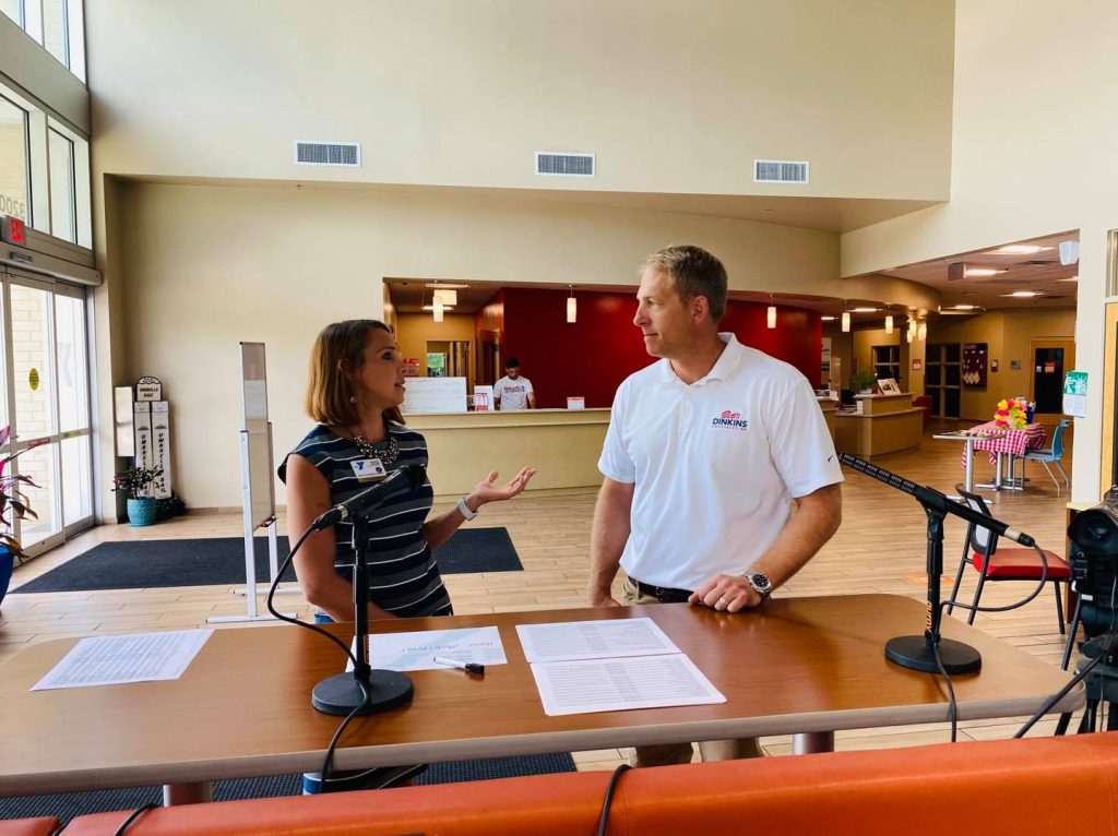 Chap Dinkins talking with a client 